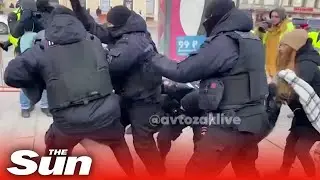 Russian police detain woman with flower protesting war on International Women's Day