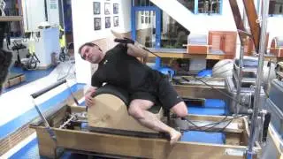 Pilates in Reformer with spine corrector