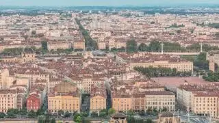 Timelapse panoramic aerial view of Lyon during sunset from Fourviere Hill. France
