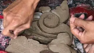Activities khmer traditional carving art on the clay by sculptor.