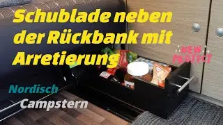 kleine Schublade im Pössl CAMPSTER mit Arretierung neben der Rückbank,verrutscht nicht nach vorn