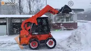 Ramtec  skid steer loader: an efficient snow clearing tool in heavy snow!