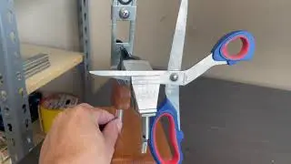 Scissors attachment for KME knife sharpening system.