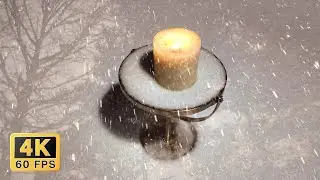 A candle in a snowstorm: winter relaxation and inspiration - Free stock video - 4K 60fps