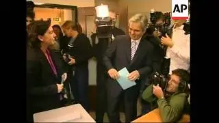 Social Democrat leader, Werner Faymann votes