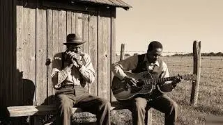 Root Blues Harmonica and Acoustic Guitar Playing a Slow, Soulful Blues in the Open Countryside