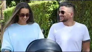 Peter Andre and wife Emily look besotted with new baby as they're seen out for the first time