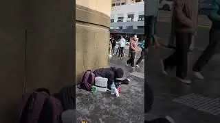 Beggar on Melbourne Street.