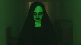 Creepy ghost nun walking looking at the camera
