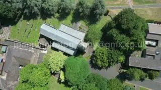 St. John the Baptist church, Corby (old village) Northamptonshire aerial video shot with DJI drone