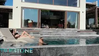 TILESTONE Pools LUXE Pools double infinity pool in natural marble