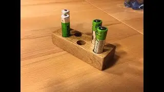 Battery holder for AA batteries
