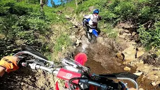 Gas Gas EC 300 2022 chase WRF 250 in a rocky creek