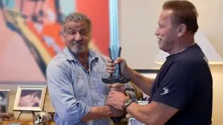 Sylvester Stallone Holds Arnold's Conan Sword!