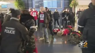 Airline Catering Workers Rally At JFK Airport, 34 Arrested