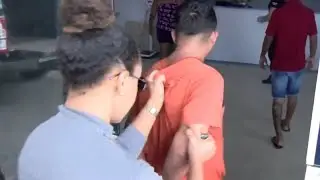 Two men were handcuffed and arrested by female police officers.pt1