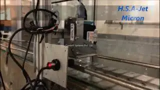 Automatic printing on plastic (Pet) glass | H.S.A-Jet Micron | Condot Systems Pvt. Ltd