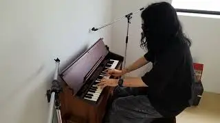 Playing the Japanese-made antique organ