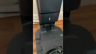 Roomba putting base on charging station