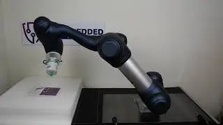 Kleine Vakuum-Pumpe ECBPMi von Schmalz mit Doosan Robotics M0609 Roboter. Sauganwendung