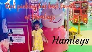 Girl at HAMLEYS picking up her favourite toys | best loved toys 🧸