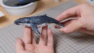 A humpback whale made of clay and epoxy trapped in a fishing net#diorama  #resinart  #humpbackwhale