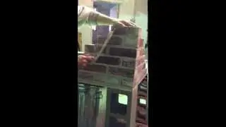 Student using Charlie's brick laying techniques