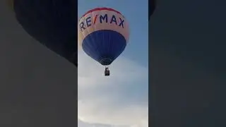 Air Balloon Flying Low. Millwoods  Edmonton Alberta. video by Carolyn A.