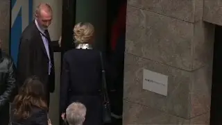 Brigitte Macron arrives at her husband's campaign HQ