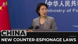 China's expanded spying laws raise concerns for foreigners and businesses