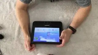 Распаковка Android-планшета, воспроизводящего DVD