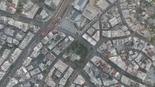 D-Log M. Antalya, Turkey. Top-down aerial drone view of modern urban development with shopping ma...