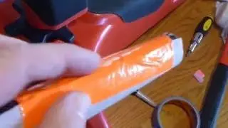 Sanding the barrel groove on a rifle stock