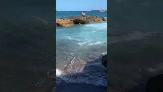 Rough Waves Chase Kids into Ocean Pool