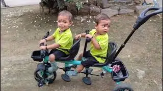 Evening Ride 🚲 #cutebaby #twinmoments #cute #twinmoments #bicycle #rider #enjoy #twins 