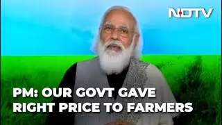 Prime Minister Narendra Modi interacts with farmers at a fund-releasing event today