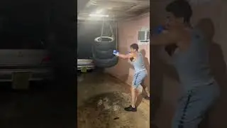 Training in Puerto Rico👀 Tire Heavy Bag #shorts #boxing
