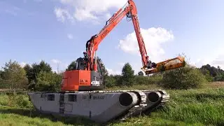 Hitachi 85US Long Reach Amphibious Excavator Cleaning A Creek