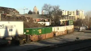 NS 1010 leads NS Train 290 in Atlanta, GA