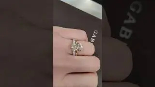 3 carat oval #solitaire in Yellow Gold and a chevron band in White Gold