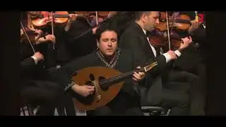 Oud with orchestra by kinan adnawi with national syrian orchestra for Arabic music .