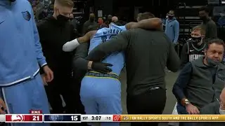 Ja Morant was helped to the locker room with what appeared to be an ankle injury