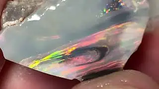 Mulga Reds on semi black Lightning Ridge Rubbed opal