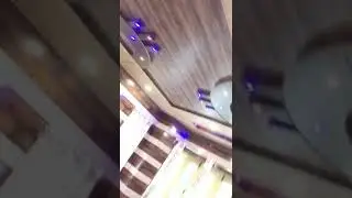 Laminate wooden paneling and PVC false ceiling