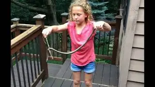 Little Brave Girl Catch a Snake and Show it to Her Family