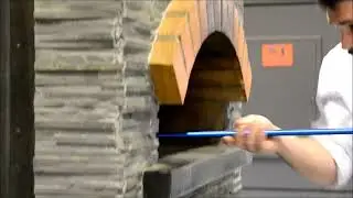 Cooking a pizza in a Univex Dome Pizza Oven