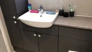 Walk in shower room with Roper Rhodes fitted furniture