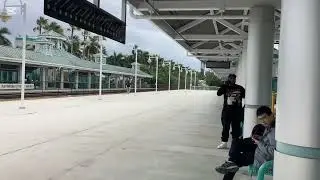 United airlines 737 landing at Fort Lauderdale international airport, Florida  followed by Train