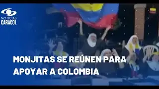 Al mejor estilo de las barras bravas, monjitas animan a la selección Colombia