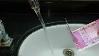 Water test of new Indian currency